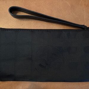 Chanel travel line clutch